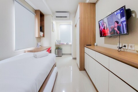 B 레지던스의 따뜻하고 아늑하게 디자인된 스튜디오 아파트먼트