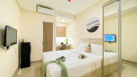 B 레지던스의 심플하고 넓은 스튜디오 아파트먼트