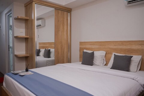 안와 레지던스의 편안하게 디자인된 스튜디오 아파트먼트