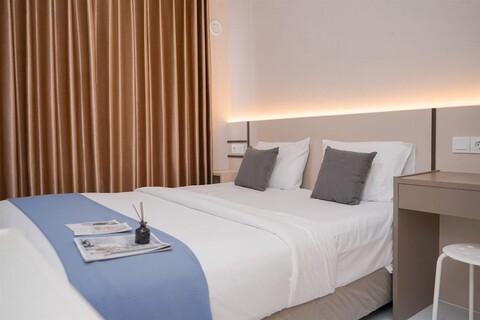 스카이 하우스 BSD 아파트먼트의 심플하고 아늑한 스튜디오 룸