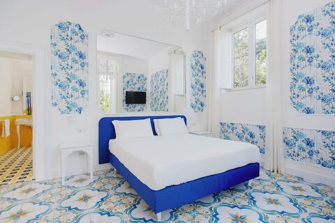 렐라이스 코레알레 롬스 & 가르덴