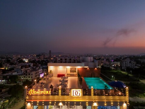 Hotel De Glance - Udaipuri Restaurant I Terrace Swimming pool I Banquet