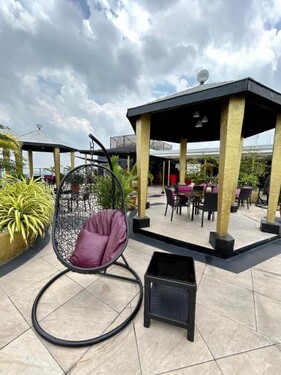 Deluxe room with king bed and Balcony at Kandi Palace