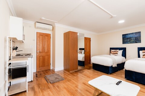 퀸즈웨이의 따뜻한 아파트먼트