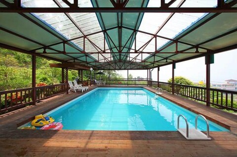 Sea Pension with Wildflowers