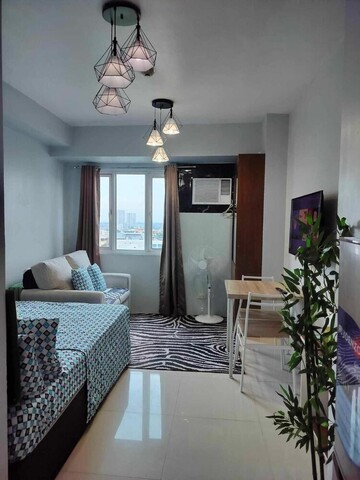 프라이빗 수영장과 도시 전망이 있는 케손 시티의 아늑한 스튜디오 유닛