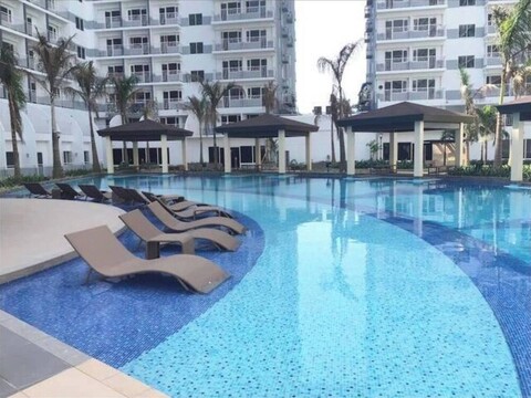 파사이 시티의 쉘 레지던스에서 휴식 - 당신의 집 같은 집