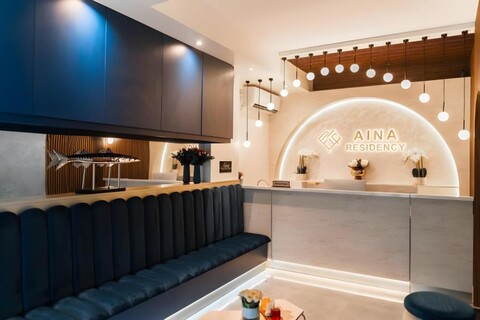 Aina Residency Beachfront Hotel