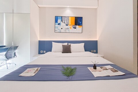 트랜스파크 빈타로 아파트먼트의 미니멀리스트 기능성 스튜디오