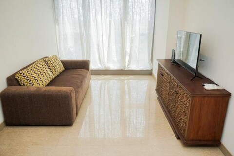 Cozy and Spacious 1BR Apartment at Branz BSD By Travelio