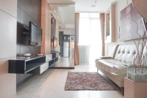 Elegant  and Comfy 1BR with Extra Room Apartment at Bellagio Residence By Travelio