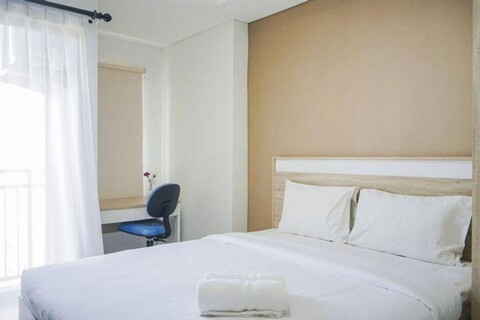 Minimalist and Comfy Studio Springwood Apartment By Travelio