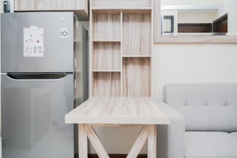 Comfort and Minimalist 2BR Apartment Springwood Residence By Travelio