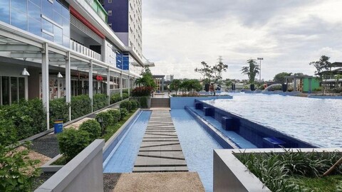 Connected to Mall 2BR Apartment at Green Pramuka City By Travelio