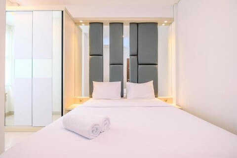 Simply Modern and Classic 2BR at Transpark Cibubur Apartment By Travelio