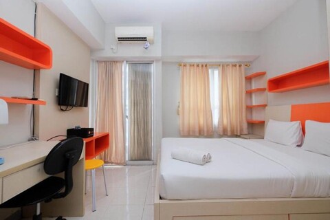 Simply and Homey Studio at Taman Melati Margonda Apartment By Travelio