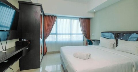 Pool View Studio Apartment @ Springlake Summarecon Bekasi By Travelio