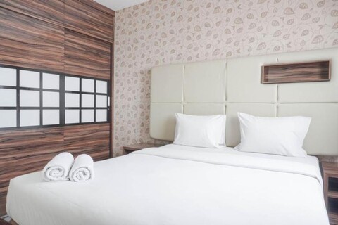Well Appointed 1BR at The Wave Kuningan Apartment By Travelio