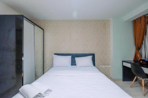 Homey and Tidy Studio Apartment at Margonda Residence 3 By Travelio