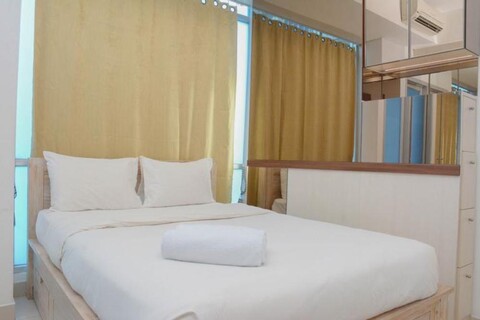 Nice and Comfy Studio Apartment Capitol Park Residence By Travelio