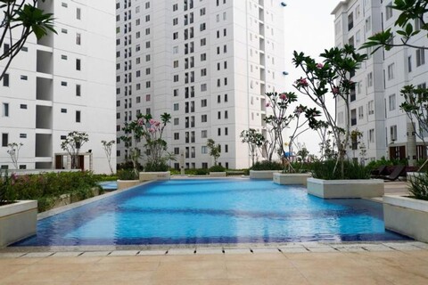 Comfy and Tranquil 2BR Bassura City Apartment near Mall By Travelio