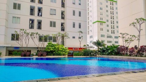 Comfort and Modern 2BR at Bassura City Apartment By Travelio
