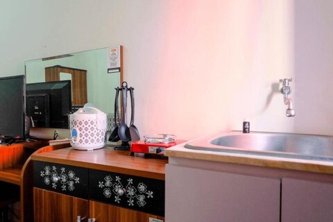 Simply Studio Apartment at Green Pramuka City By Travelio