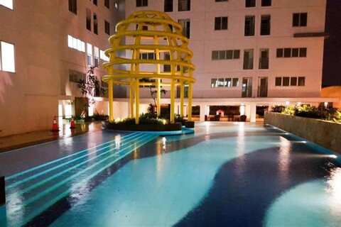 Cozy Stay and Homey Studio Apartment at Bassura City Apartment By Travelio