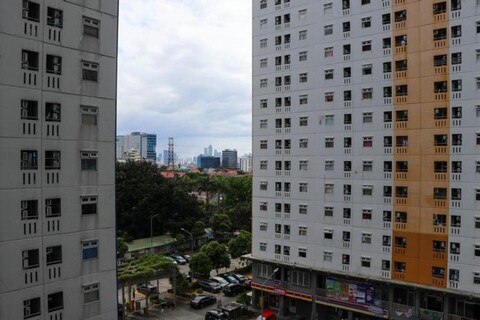 Cozy and Enjoy Studio Room at Green Pramuka City Apartment By Travelio