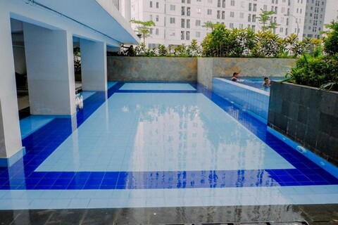 Furnished and Relaxing 2Br Bassura City Apartment Near Mall by Travelio