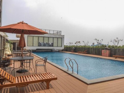 Minimalist and Comfy Studio Dave Apartment by Travelio