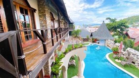 Hotel Tropicana Castle Sabang Mindoro