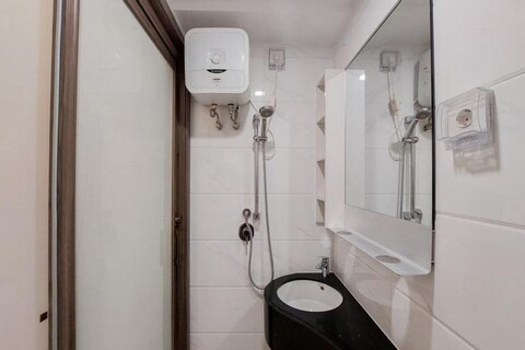 Fully Furnished with Tidy Design Studio at Sky House BSD Apartment By Travelio
