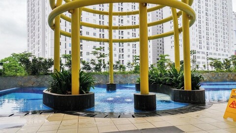 Restful 2Br Bassura City Apartment Near Shopping Mall