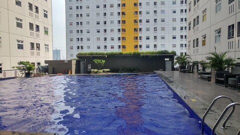 Comfy and Clean 2Br Green Pramuka Apartment