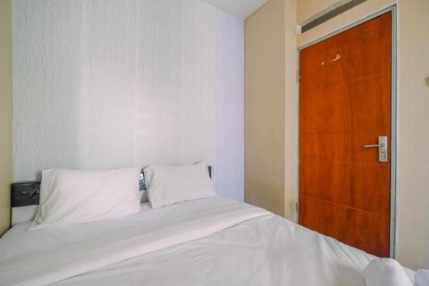 Homey and Compact 2BR Cibubur Village Apartment By Travelio