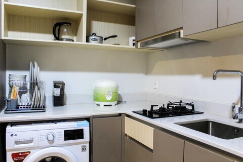 Best View 1Br Apartment at Gold Coast Pik by Travelio