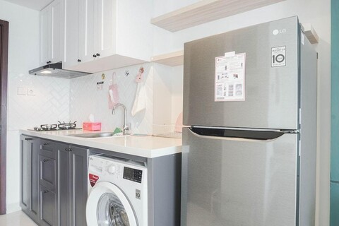 Minimalist Studio Room with City View at West Vista Apartment