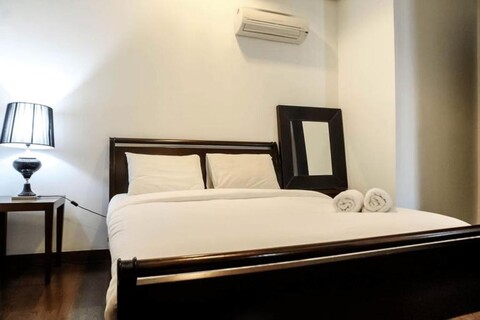Best Location 1BR The Mansion at Kemang Apartment By Travelio