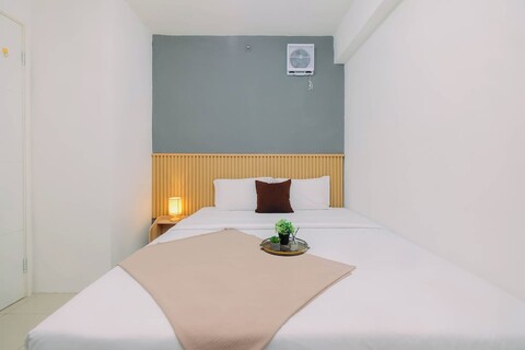 바수라 시티 아파트먼트의 컴팩트하고 미니멀리스트 디자인의 2베드룸