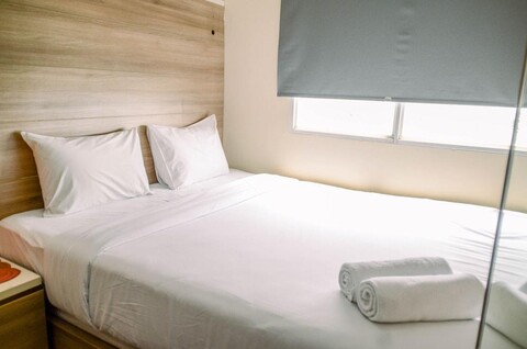 Nice and Warm 1Br at Belmont Residence Puri Apartment