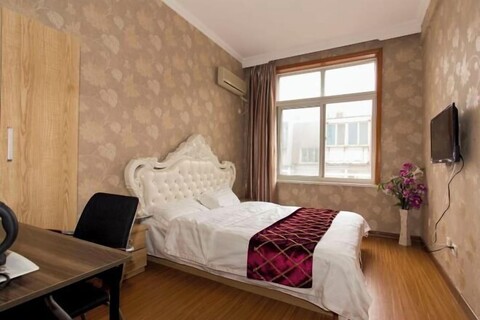 Xiaisi Lexiang Service Apartment (Dalian Xinghai Square)
