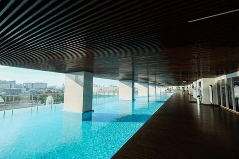 Modern Studio Menteng Park Apartment by Travelio