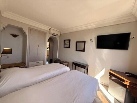 호텔 알 하르티, 시티 센터 구엘리즈