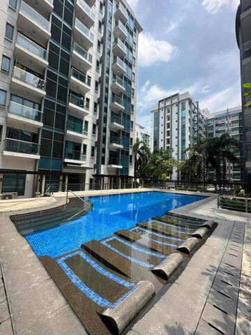 Affordable Condotel Two Palm Tree Villas Near NAIA