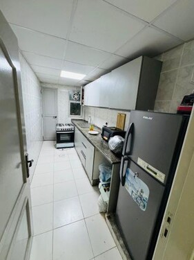 40 number building Opp GREENLAND