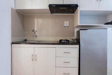 Tidy Studio Apartment at Bassura City Near Shopping Mall