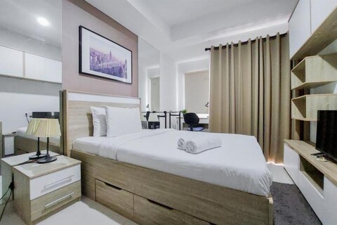 Good Deal and Comfy Studio Apartment at Springwood Residence By Travelio