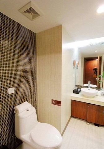Meiguo Hotel (Chengyang District Government Zhengyang Middle Road Subway Station Branch)